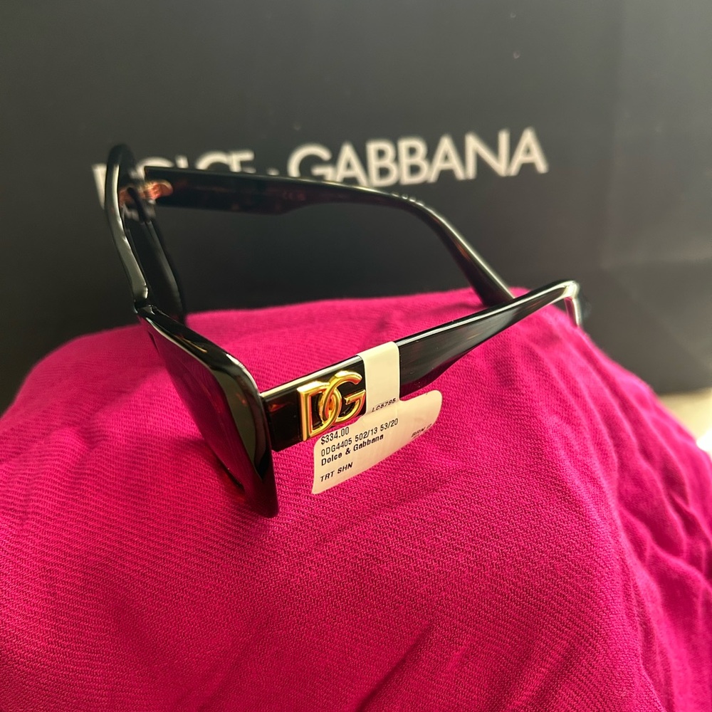 Dolce & Gabbana Black Sunglasses with Gold Logo 
Does not come with case.